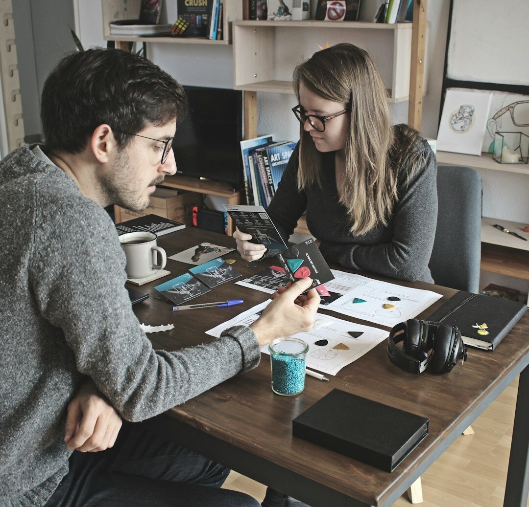 Diverse editorial team collaborating in a bright office