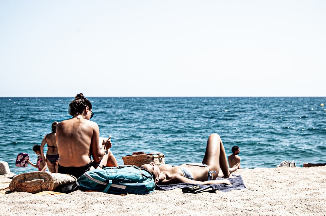 celebrity relaxing on beach